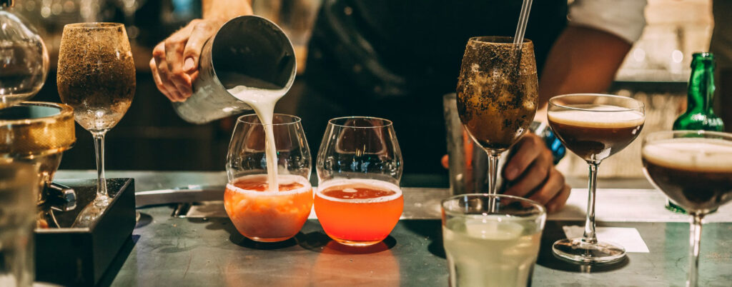 bartender making alcoholic cocktail summer cocktail bar